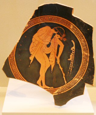 Drunken man on a Greek bowl